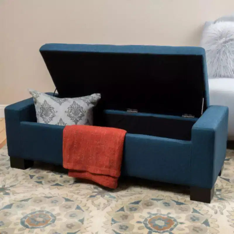 Pouffe de rangement capitonné bleu marine : Une solution d'assise élégante et spacieuse