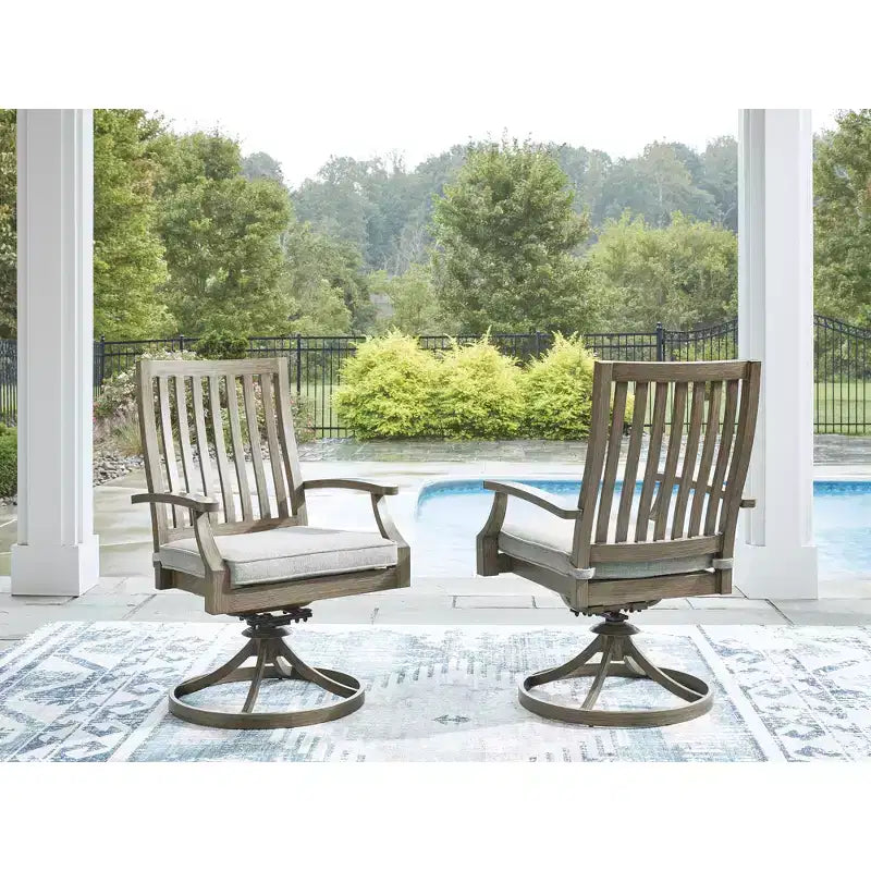 Signature Design by Ashley Rainier Ranch Outdoor Swivel Chairs with All-Weather Cushions, Set of 2, Beige
