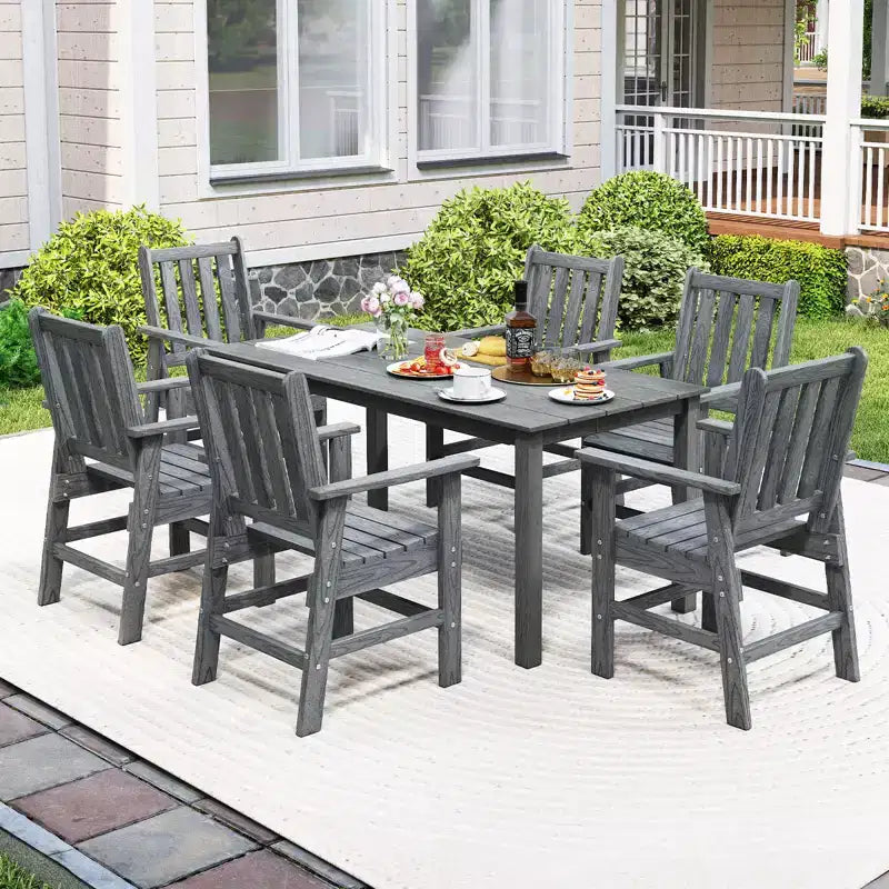 Lot de 4 chaises de salle à manger Costway pour patio avec accoudoirs larges et siège incurvé motif grain de bois pour jardin