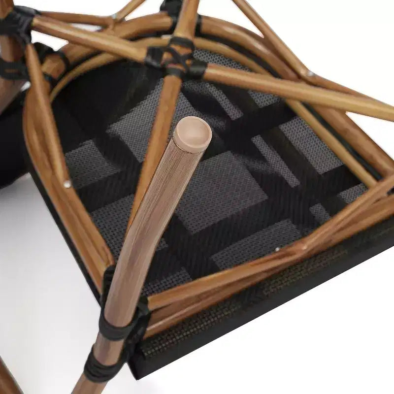 Chaise bistrot empilable Emma & Oliver Massalia avec accoudoirs, en Textilène et structure en métal imitation bambou, pour l'intérieur et l'extérieur