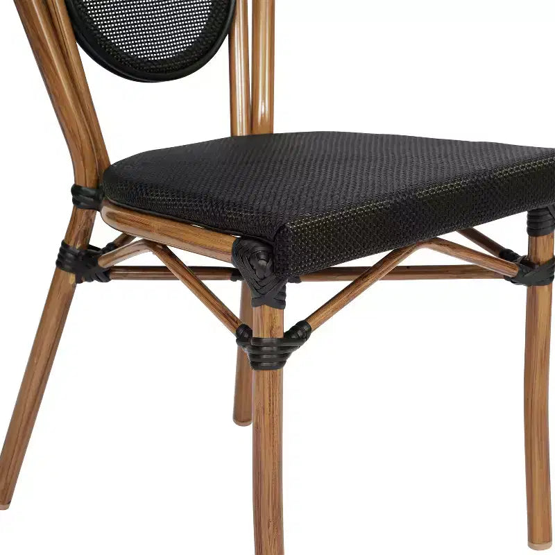 Chaise empilable Merrick Lane Mael style bistrot Thonet avec assise en textilène et cadre en métal finition bambou pour usage intérieur/extérieur