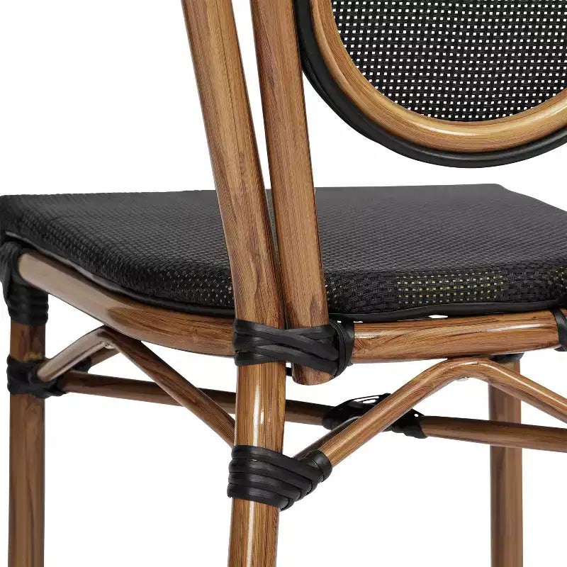 Chaise empilable Merrick Lane Mael style bistrot Thonet avec assise en textilène et cadre en métal finition bambou pour usage intérieur/extérieur